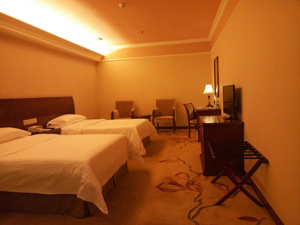 Vienna Hotel Pequim Quarto foto