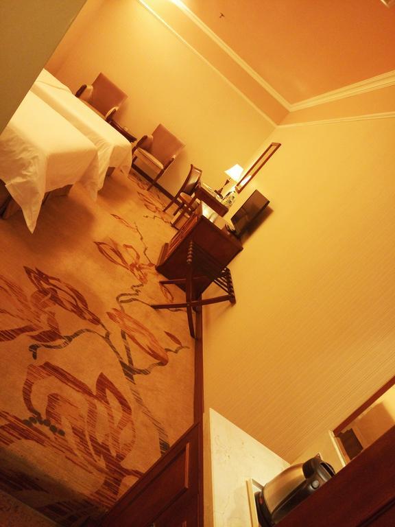 Vienna Hotel Pequim Quarto foto