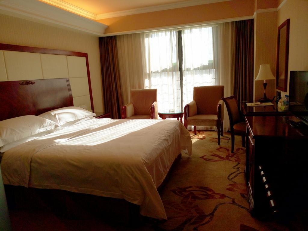 Vienna Hotel Pequim Quarto foto