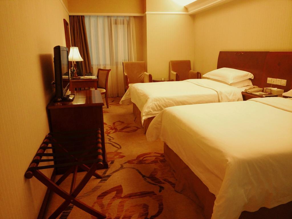 Vienna Hotel Pequim Quarto foto